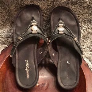 Minnetonka black leather flip-flop type sandals